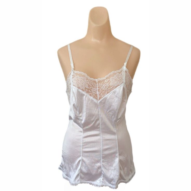 Figurfit Size 34 White Camisole Lace Undershirt Lingerie Trousseau Made USA Vtg. Made of nylon, adjustable straps, machine washable Fitted Coquette Camisole Tank Top, Coquette Fitted Tank Top With Spaghetti Straps, Sheer Fitted Tank Camisole, Daywear Camisole With Built-in Bra And Tank Straps, Fitted Lined Camisole, Camisole With Built-in Bra And Tank Straps For Daywear, Coquette Camisole With Built-in Bra, Coquette Camisole Chemise For Daywear, Coquette Camisole With Adjustable Straps