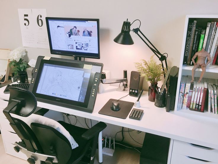 a desk with a computer monitor, keyboard and mouse next to a bookshelf