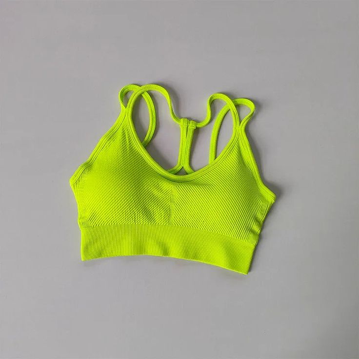 SPECIFICATIONSBrand Name: NoEnName_NullSports Type: YogaMaterial: Nylon spandexOrigin: Mainland ChinaCN: ZhejiangDepartment Name: WomenFeature: Quick DryModel Number: WX850Closure Type: No buckleChoice: yessemi_Choice: yes Seamless Stretch Tank Top For Sports, Seamless Sleeveless Green Sports Bra, Green Sleeveless Seamless Sports Bra, Seamless Sports Bra With Medium Support, Seamless Solid Crop Top For Gym, High Stretch Seamless Sports Tank Top, Seamless Sportswear Sports Bra For Summer, Green Sports Crop Top With Built-in Bra, Yellow Stretch Sports Bra For Yoga