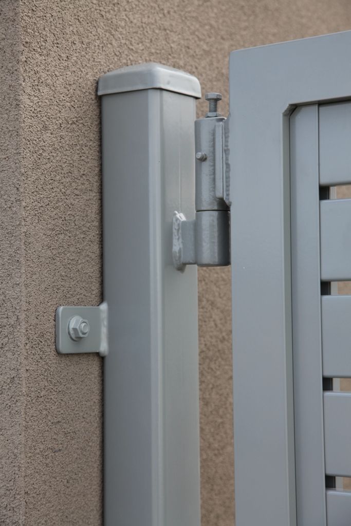 an image of a door handle on the side of a building that is closed to let in light