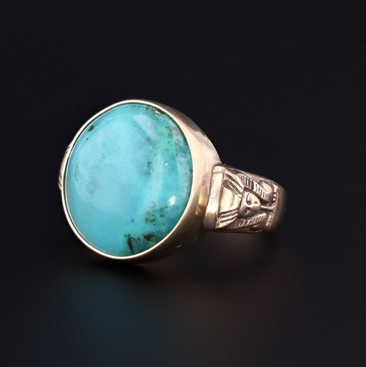 A fascination with the aesthetics of ancient Egypt was popular in the late 1700s through the early 20th century brought about by archeological discoveries and a wave of public curiosity. Egyptian jewelry was a link to ancient opulence, and it also held the allure of a legendary culture and its mysterious symbols. This intriguing Egyptian-inspired ring features a vibrant blue gem silica cabochon set in a mounting that we cast from an antique signet ring. The mounting is 14k gold and features phar Princes Ring, Chrysoprase Ring, Gem Silica, Egyptian Inspired, Archaeological Discoveries, Egyptian Jewelry, Jewelry Post, Art Nouveau Style, Blue Gems