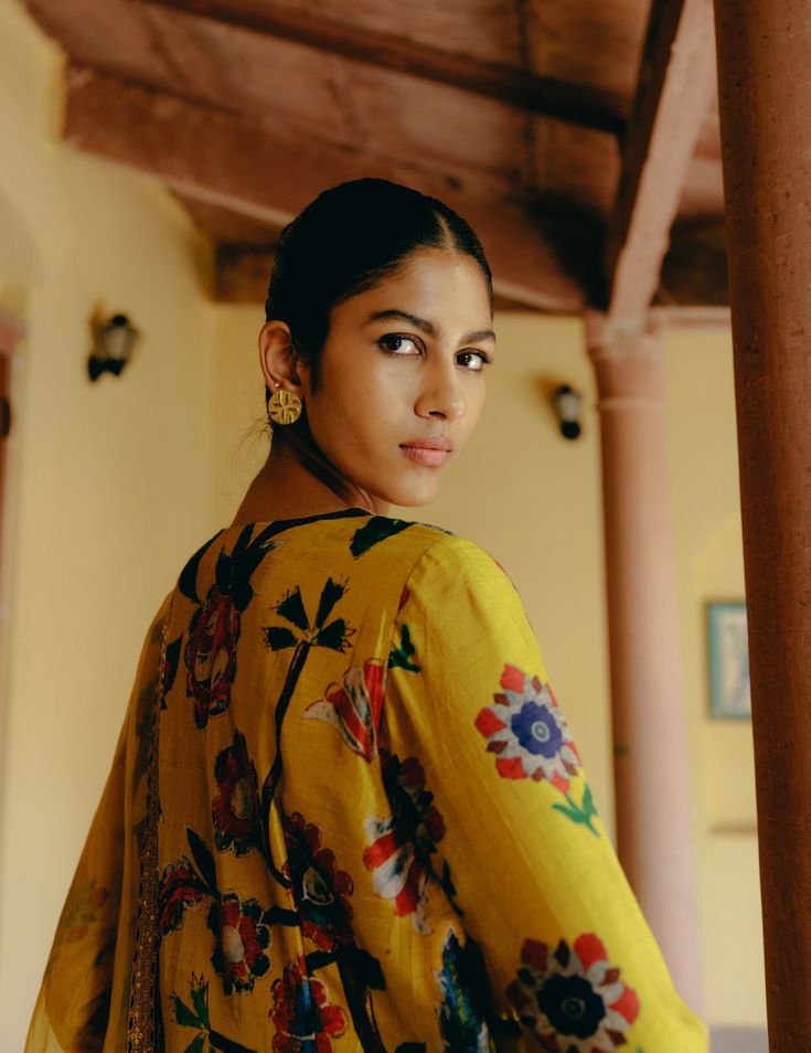 Stunning yellow mix print kurta in dupion silk, featuring a hand-embroidered neckline and sleeve hems, paired with matching printed dupion silk, pants. Kurta And Pants, Kalamkari Print, Yellow Kurta, Kurta Pant Set, Dupion Silk, Embroidered Neckline, Straight Kurta, Women Kurta, Kurta With Pants