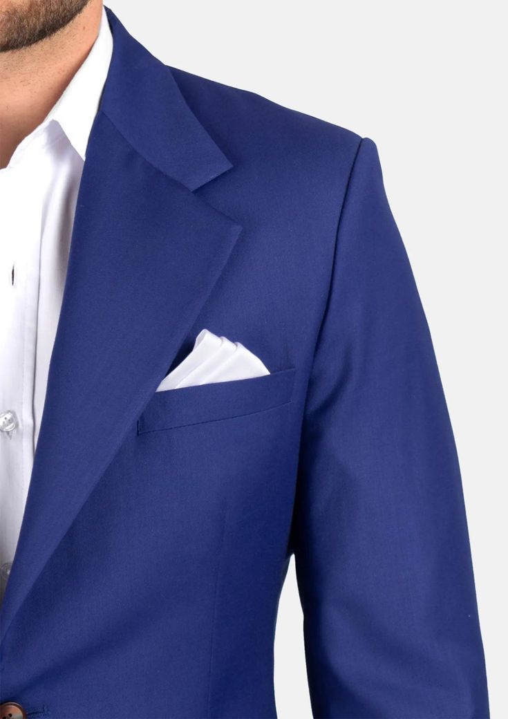 A distinct and striking look, the Ellis Royal Blue Twill suit is custom made for those who want to make a statement. The vibrant color features a subtle hint of purple for a bold look. Exude confidence in royal blue. Classic Purple Tuxedo For Semi-formal Events, Fitted Blue Tuxedo Blazer, Royal Blue Long Sleeve Suit For Wedding, Tailored Blue Three-piece Suit With Long Sleeves, Tailored Blue Single Breasted Tuxedo, Tailored Single Breasted Blue Tuxedo, Elegant Tailored Three-piece Suit In Royal Blue, Elegant Tailored Royal Blue Three-piece Suit, Fitted Royal Blue Business Blazer