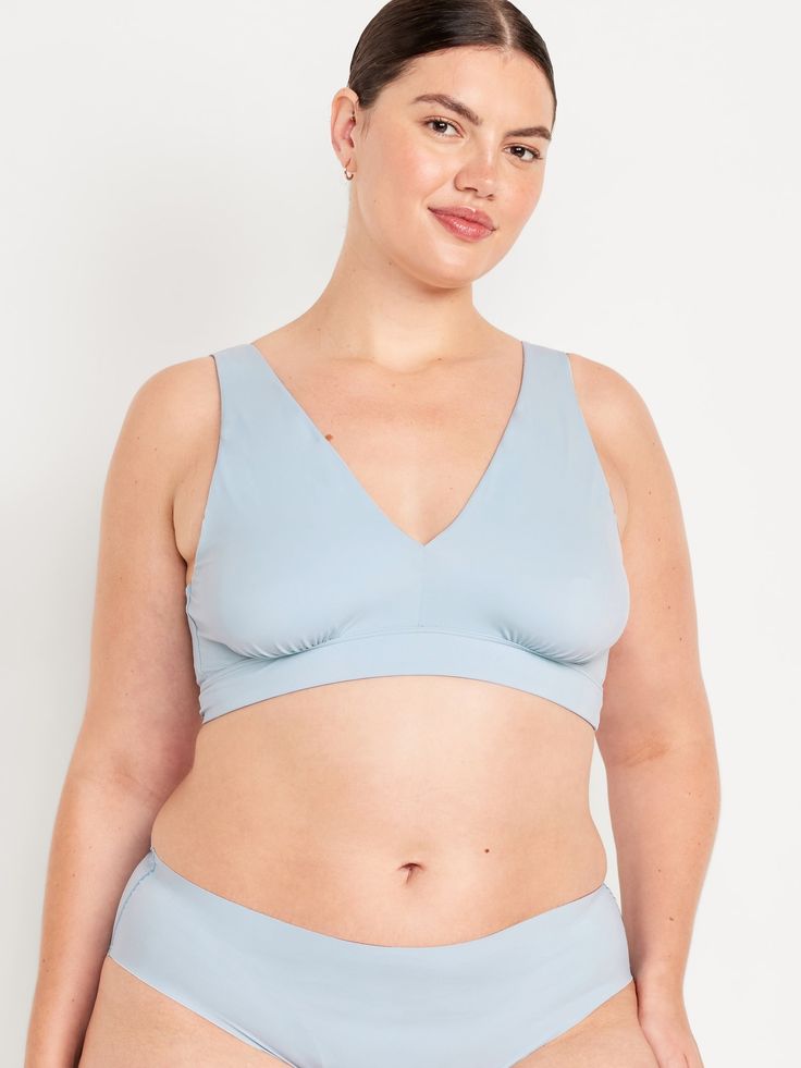 deep v-neck wide straps elastic-banded hem fitted high coverage hits above ribcage light support for a-c cups xs = 34a, 32b cup sizes s = 32c, 34b, 36a cup sizes m = 34c, 34d, 36B, 36c, 38b cup sizes l = 34d, 34dd, 36c, 36d, 38b, 40b cup sizes xl = 38dd, 40d, 40dd cup sizes xxl = 42d, 42dd cup sizes models are approx.  5'9" and wear sizes s (4), l (12), and xl (18)machine wash according to the care instruction label Summer Full Coverage Stretch Nursing Bra, Summer Nursing Bra With Medium Bust Support And Stretch, Fitted Triangle Top Sports Bra With Medium Bust Support, Seamless Fitted Nursing Bra With Wide Straps, Fitted Solid Color Nursing Bra For Summer, Fitted Seamless Nursing Bra With Wide Straps, Supportive Medium Bust Support Bra For Summer, Summer Stretch Solid Nursing Bra, Fitted Light Support Summer Bra