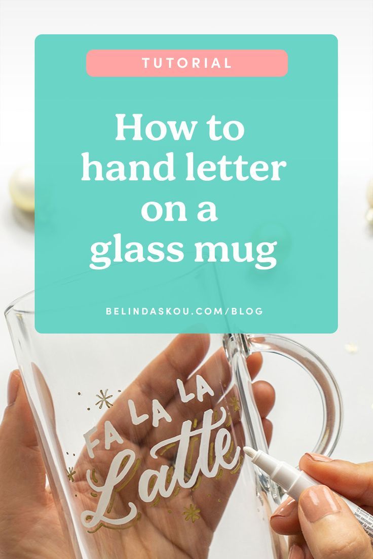 someone holding a glass mug with the text how to hand letter on a glass mug