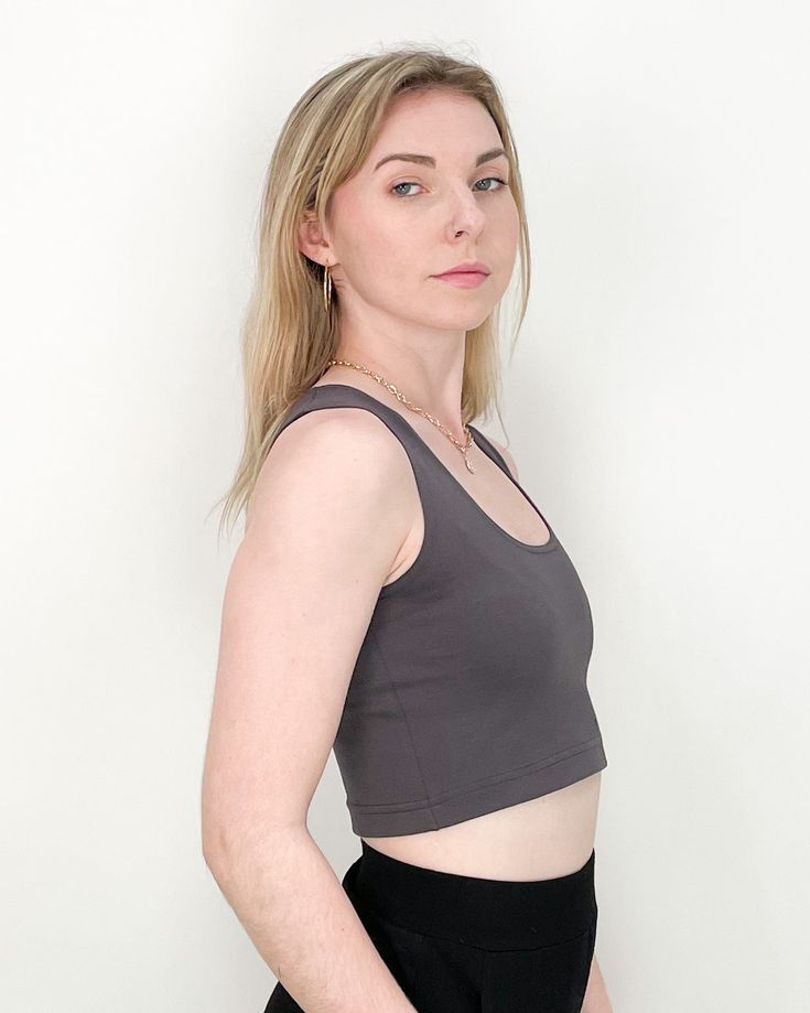 TO TRANSFORM: Wear with the high neckline in the front or flip it around and bring the scoop neck to the front and show a little chest. Sparrow crop is a cool, cropped version of our Sparrow top. PRODUCT DETAILS: - 60% Rayon, 33% Nylon, 7% Lycra- Moisture wicking and four-way stretch - Machine washable and dryer safe - MADE IN USA - Model: Talia is wearing a size small View our shipping and returns policy We'd love to hear from you! Email hello@paridaez.com with any questions. Fitted Crop Top With Built-in Bra And Scoop Back, Casual Tops With Bra-friendly Scoop Back, Versatile Stretch Crop Top With Built-in Bra, Chic Scoop Neck Crop Top With Built-in Bra, Versatile Cropped Tops With Built-in Bra, Cropped Seamless Sports Bra, Chic Yoga Crop Top With Built-in Bra, Stretch Crop Top For Yoga, Stretch Cropped Yoga Crop Top