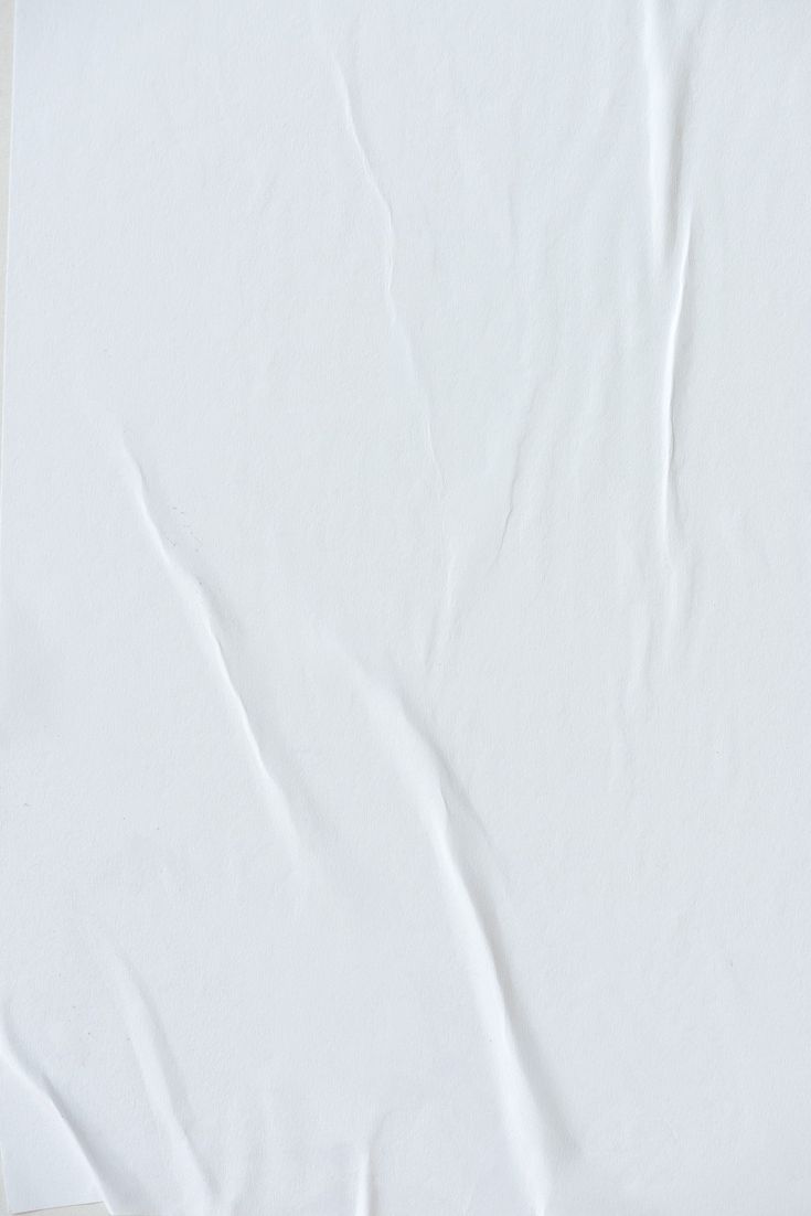 an empty white sheet of paper on a table