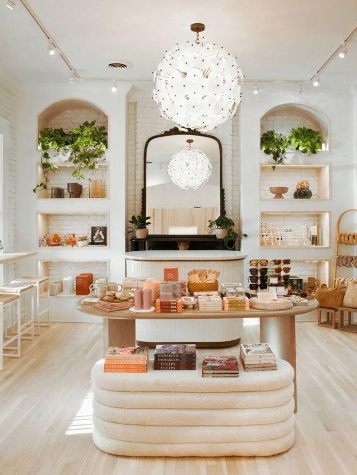 the interior of a store with lots of furniture