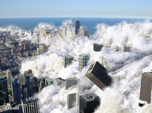 an aerial view of the city and ocean with huge waves crashing over buildings in the foreground