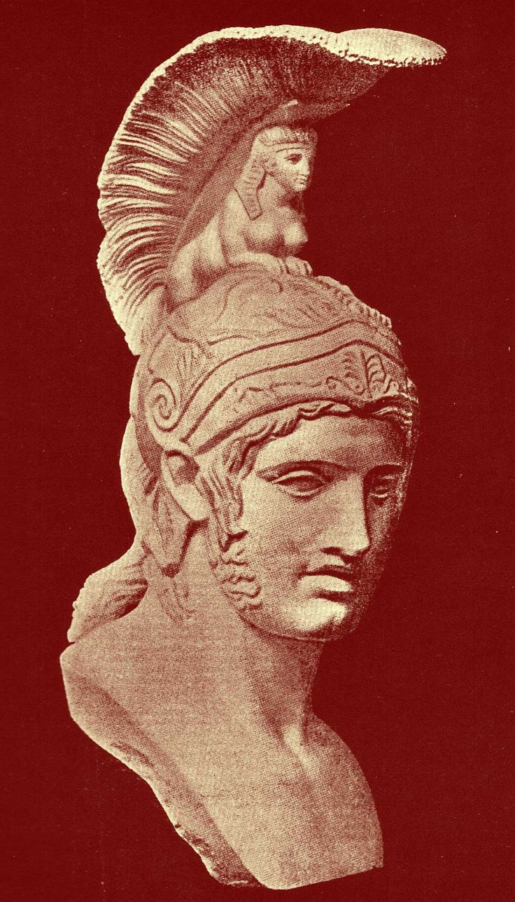 an old photo of a bust of a man wearing a helmet with feathers on it