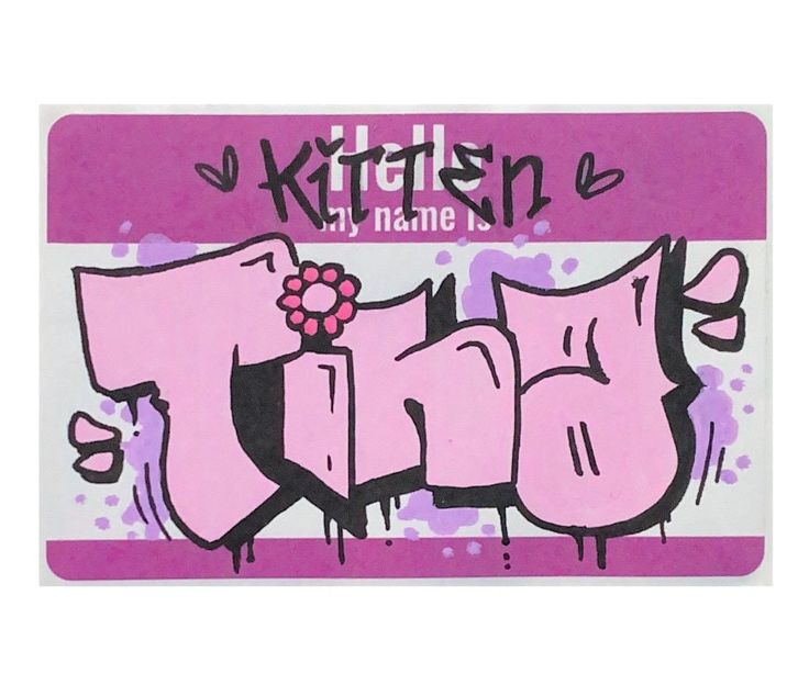 a pink sticker with the words kitchen written in black and white letters on it