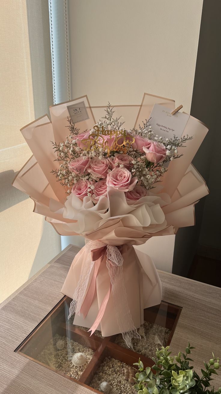 a bouquet of flowers sitting on top of a table