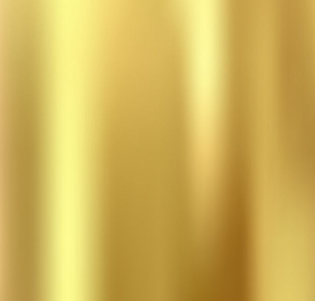 a blurry image of gold colored material