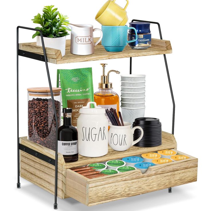 two tiered shelf with coffee cups, mugs and other items on it in front of a white background