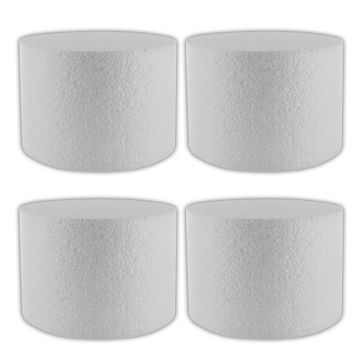 four white lampshades on a white background