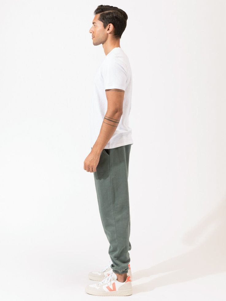 Our best-selling tee turned into a collection. Stain-resistant, quick-drying, sweat-proof, odor-free, and nano free technology makes this 100% cotton fleece jogger truly revolutionary. Sporty Cotton Activewear For Everyday, Everyday Sportswear Activewear With Ribbed Waistband, Green Casual Cotton Activewear, Solid Color Cotton Activewear With Athletic Fit, Cotton Joggers With Straight Hem, Cotton Athletic Fit Activewear In Solid Color, Solid Cotton Moisture-wicking Activewear, Cotton Relaxed Fit Sweats For Sports, Relaxed Fit Cotton Sweats For Sports