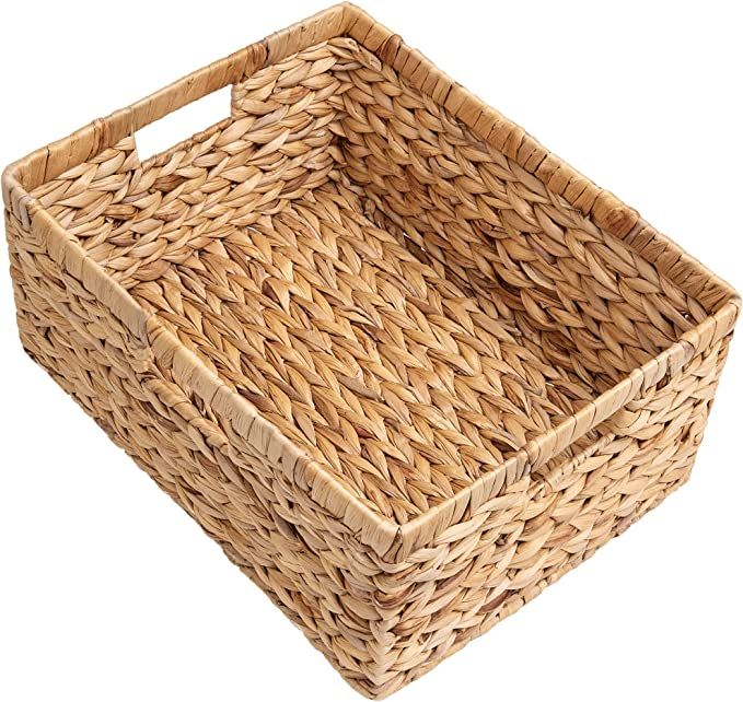 an empty wicker basket on a white background