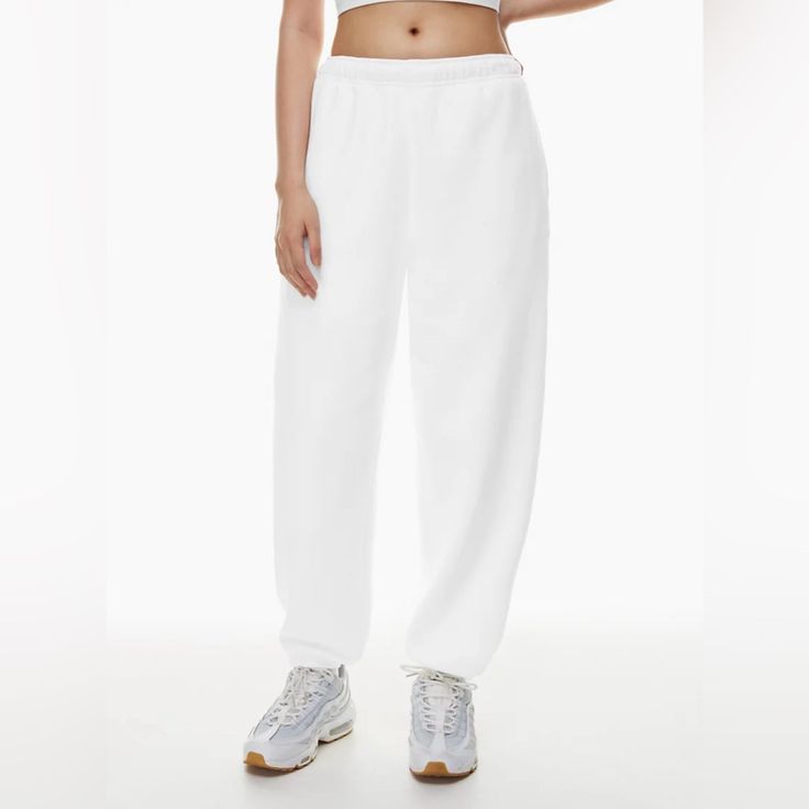 Brand: Aritzia Style: Cozy Fleece Mega Sweatpants Size: 2xs Color: White Condition: New With Tags, Perfect! Super Soft And Comfy Never Worn Aritzia Tna Sweatpants!! White Sweats With Elastic Waistband For Jogging, White Sweatpants With Elastic Waistband For Jogging, White Sweatpants With Ribbed Waistband For Jogging, White Bottoms For Jogging In Winter, White Sweatpants For Winter Jogging, White Jogging Pants With Pockets, White Winter Sweatpants For Jogging, White Casual Pants With Comfort Waistband, White Relaxed Fit Bottoms With Ribbed Waistband