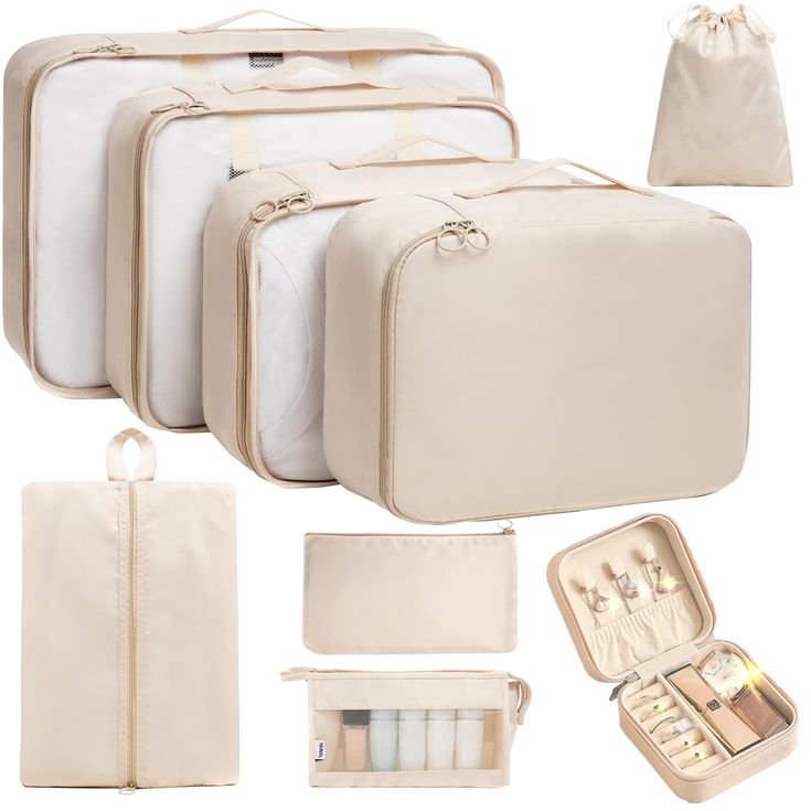 four pieces of white luggage are shown with the contents in their bags and one is empty