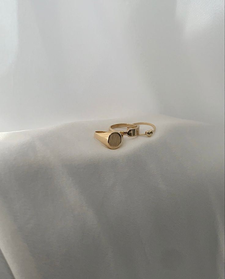 The 14k Solid Gold Signet Ring features a 11 x 9mm oval signet with a faint brushed finish. Carrying years of history, the Signet Ring is a timeless piece that will hold it's value for infinity. Item Details: 14k Solid Gold Hollow signet Size 7 PLEASE NOTE: Our current timeframe for handcrafting this Solid Gold ring is 2-4 weeks before dispatch. Please email us at contact@loveisabelle.com for specific timeframe enquiries. Timeless Oval Signet Ring, Tarnish Resistant, Timeless Oval Cabochon Signet Ring As Gift, Timeless Oval Signet Ring Tarnish Resistant, Luxury Oval Signet Ring For Everyday, Minimalist Oval Cabochon Signet Ring For Formal Occasions, Minimalist Oval Cabochon Signet Ring For Formal, Minimalist 14k Gold Oval Signet Ring, Minimalist 14k Gold Oval Link Rings, Minimalist Initial Ring With Polished Finish And Oval Shape