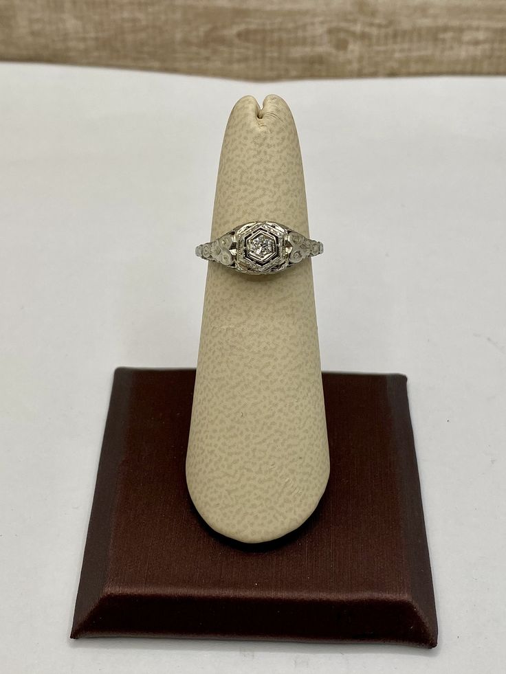 Welcome To Gold Knox This stunning art deco ring is beautifully crafted on 14K white gold. This ring features high quality diamond set in filigree six prong setting. This would be a great gift Mother's Day or any other spacial occasion. Details below: Material 14K white gold, diamond Size US 4 3/4 Please, be sure to view the pictures carefully as it is the exact item you are buying. This would make great addition to your vintage collection. Thank you for looking Gold Knox opened its storefront i Formal 14k White Gold Filigree Ring, Elegant Filigree Solitaire Ring For Formal Occasions, Formal White Filigree Ring, Classic Formal Filigree Ring In Diamond White, Antique White Gold Jewelry With Single Diamond, Formal Solitaire Filigree Ring Fine Jewelry, Elegant Solitaire Filigree Ring For Anniversary, Formal Silver Solitaire Filigree Ring, Antique Solitaire Filigree Ring For Formal Occasions