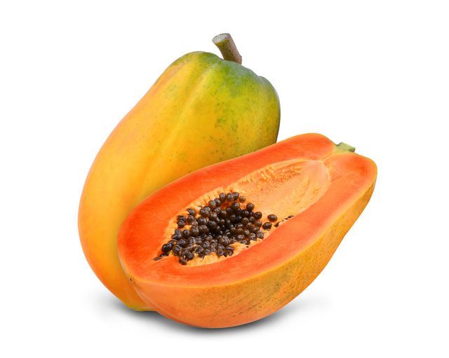 two pieces of papaya, one with seeds and the other with fruit on it