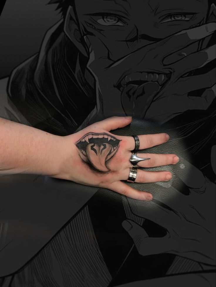 a woman's hand with a tattoo on it