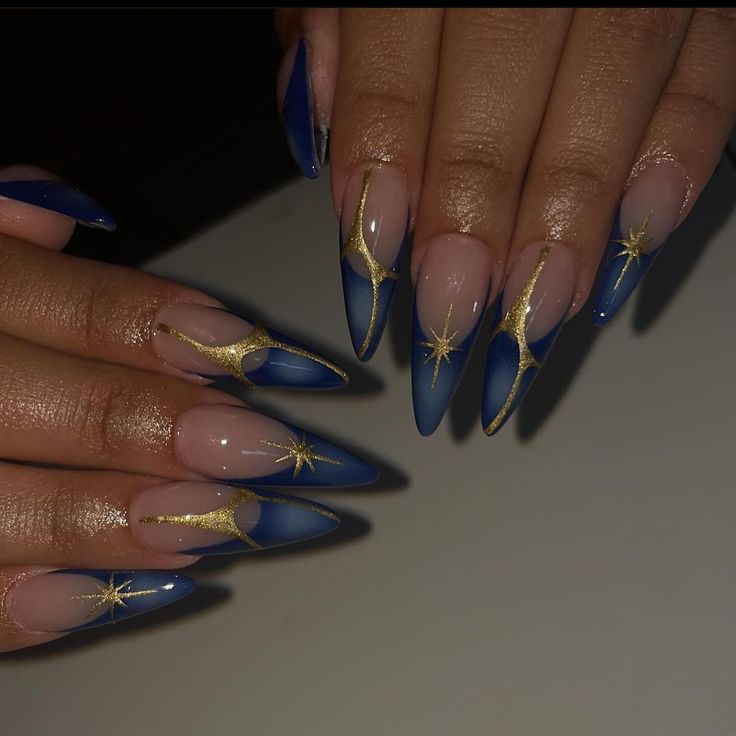 Dark Blue And Gold Nail Designs, Blue And Gold Nails Ideas, Long Birthday Nail Designs, Gold Stiletto Nails Designs, Lapis Lazuli Nails, Royal Blue Winter Nails, Almond Nails Blue Design, Nail Designs Blue And Gold, Blue With Gold Nails