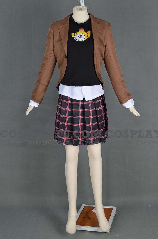 a female mannequin wearing a brown jacket and plaid skirt with black shirt underneath