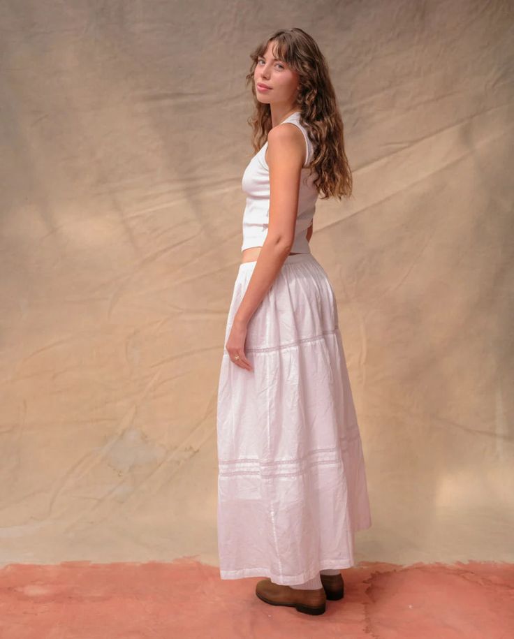 An easy take on the classic white maxi skirt. This beauty is so light, but lined so it isn’t see through. It features delicate lace and detailing, an elasticated waist, and sits at your mid-waist. A wardrobe staple! Winter Sunglasses, Mask Cream, White Maxi Skirt, White Maxi Skirts, Clean Candle, Clean Fragrance, Facial Sunscreen, Sunless Tanning, Body Cleanser