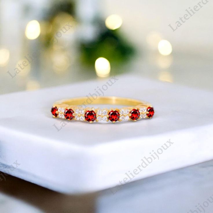 Half Eternity Garnet Cluster Band, 14K Yellow Gold Diamond Jewelry, January Birthstone Stacking Band Alternative Band Christmas Gift For Her Brand - LATELIERDBIJOUX Type Of Stone - Garnet  Stone Color - Red Stone Creation - Lab Created Cut of Stones - Round Stone size - 2 mm Birthstone - January Secondary stone- CZ Diamond Stone Shape- Round Stone Color - Colorless Check out my other items!   PAYMENTS   We accept PayPal, If we do not receive payments immediately we will hold the item only for one working day for your payments and we will be re-listing the item afterward. if there is difficulty in paying for the item/s you have bought immediately please contact us so we can hold your item. FEEDBACK Please contact us if you have any problem with the product before leaving negative feedback, White Gold Jewelry For Christmas Wedding, Cubic Zirconia Jewelry For Christmas Anniversary, Christmas Anniversary Jewelry With Cubic Zirconia, Christmas Anniversary Cubic Zirconia Jewelry, Ruby Half Eternity Jewelry Gift, White Gold Jewelry For Christmas Anniversary, Elegant Christmas Anniversary Rings, Yellow Gold Round Christmas Jewelry, Yellow Gold Round Jewelry For Christmas