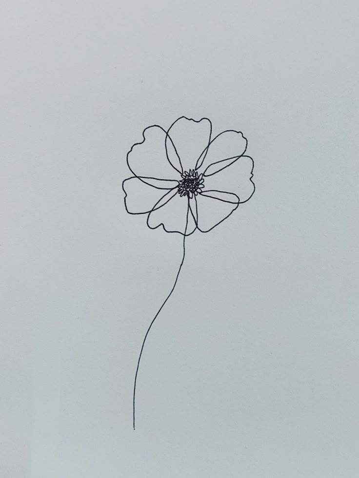 a black and white photo of a single flower on a gray background with the word love written below it