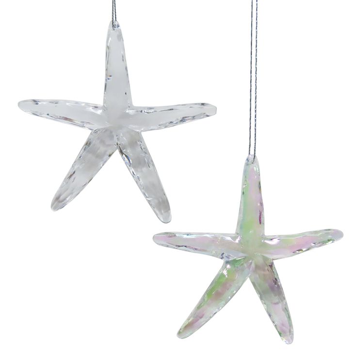 two glass starfish ornaments hanging from strings