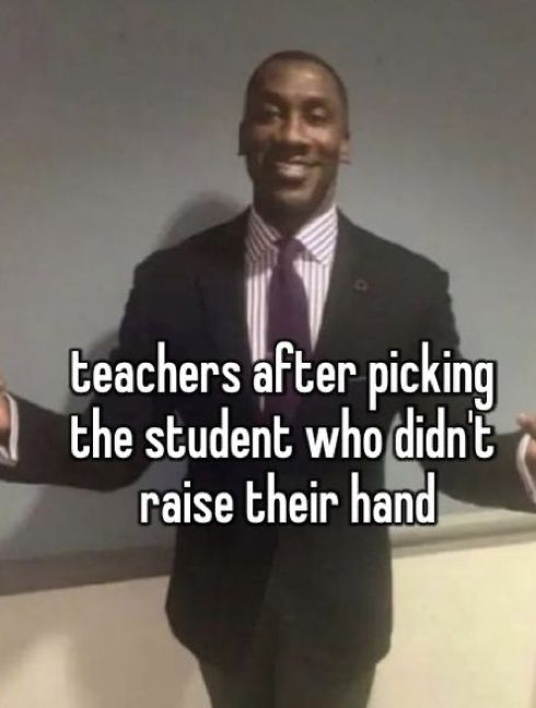 a man in a suit and tie with his hands out, saying teachers after picking the student who didn't raise their hand