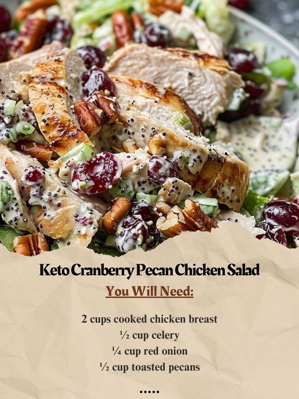 chicken salad with cranberries and pecans on it