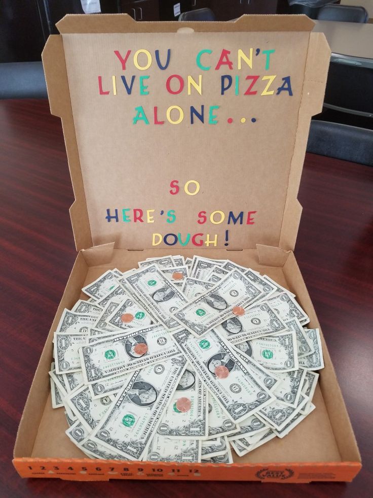 a pizza box that has money in it