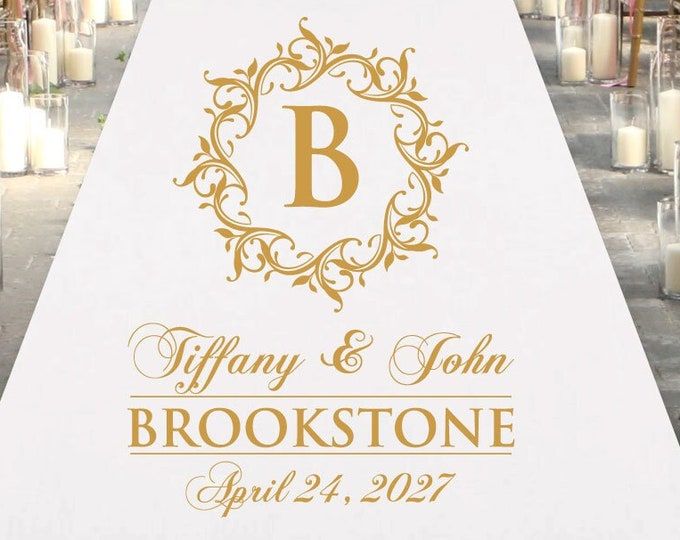 a wedding ceremony aisle with candles and monogrammed sign on it that reads, tiffany & john brookstone