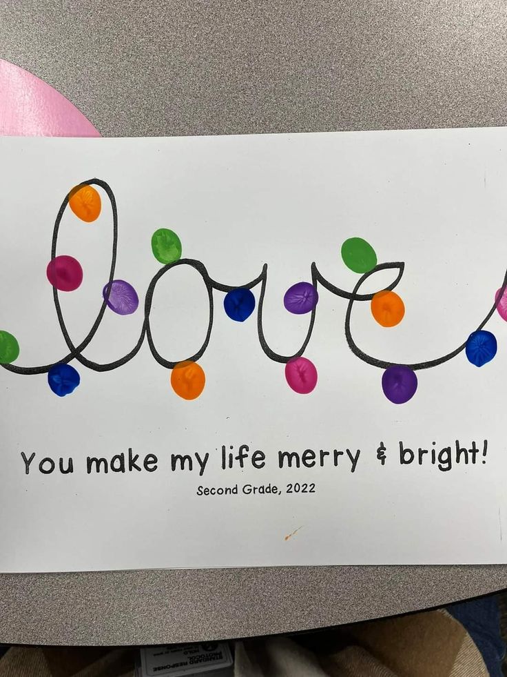 a sign that says love you make my life merry and bright