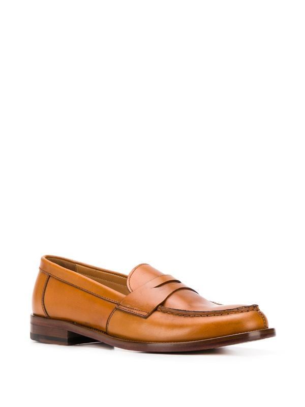 Shop brown Scarosso Harper slip-on loafers with Express Delivery - Farfetch Brown Leather Slip-on Loafers, Brown Leather Sole Slip-on Loafers, Brown Slip-on Loafers With Perforations, Luxury Brown Slip-on Loafers, Brown Slip-on Loafers Medium Width, Moccasins Shoes, Moccasins, Low Heels, Calf Leather