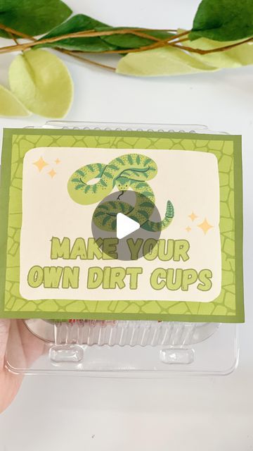 someone holding up a card with the words make your own dirt cups