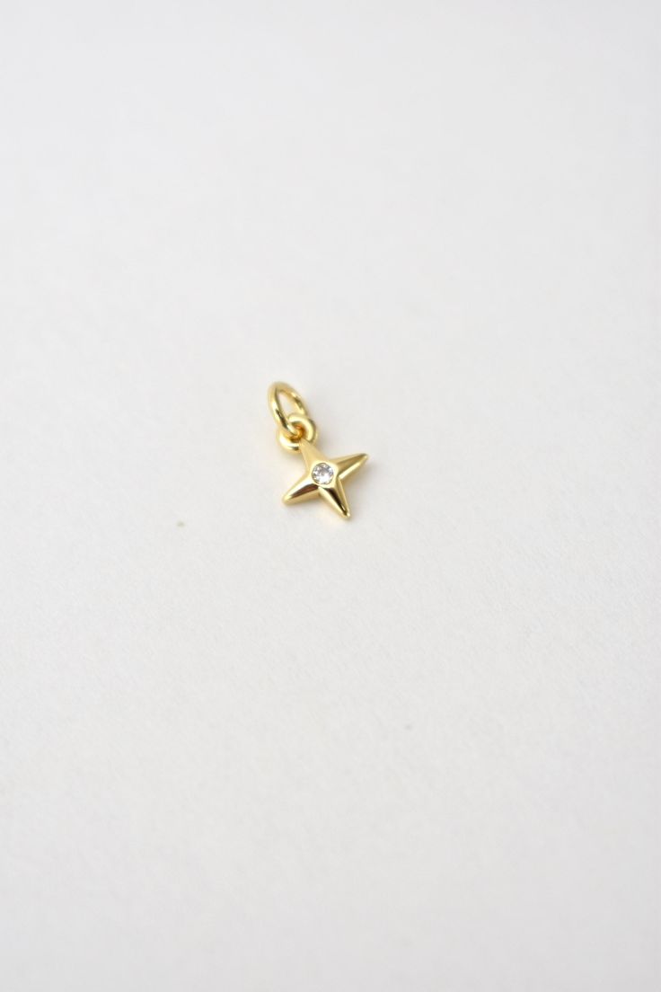 The sweetest little 14k gold filled charms in a variety of styles. Add to an existing necklace or purchase our 16k gold filled chain for it to arrive on. Lead Free, Nickel Free. Tiny Gold Jewelry For Everyday, Everyday Star-shaped Jewelry With Charms, Dainty Small Charms Jewelry, Small Dainty Charms Jewelry, Yellow Gold Star Charm Pendant Necklace, Dainty Nickel-free Pendant Charms, Yellow Gold Everyday Charm Necklace With Star Charm, Small Everyday Charm Necklaces, Everyday Yellow Gold Charm Necklace With Star