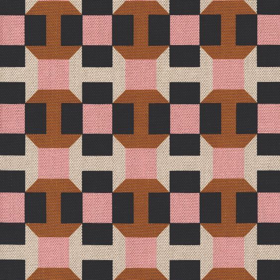 a pink and black checkered pattern on fabric