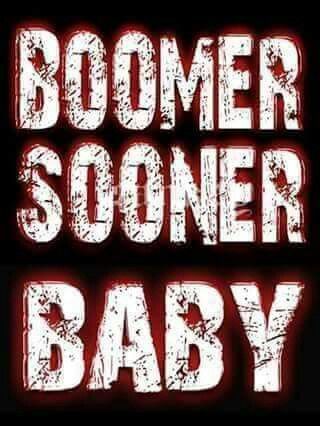 the words boomer sooder baby are in red letters on a black background with white lettering