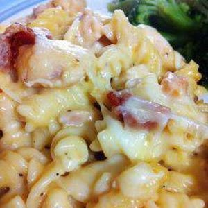 a plate with pasta and broccoli on it