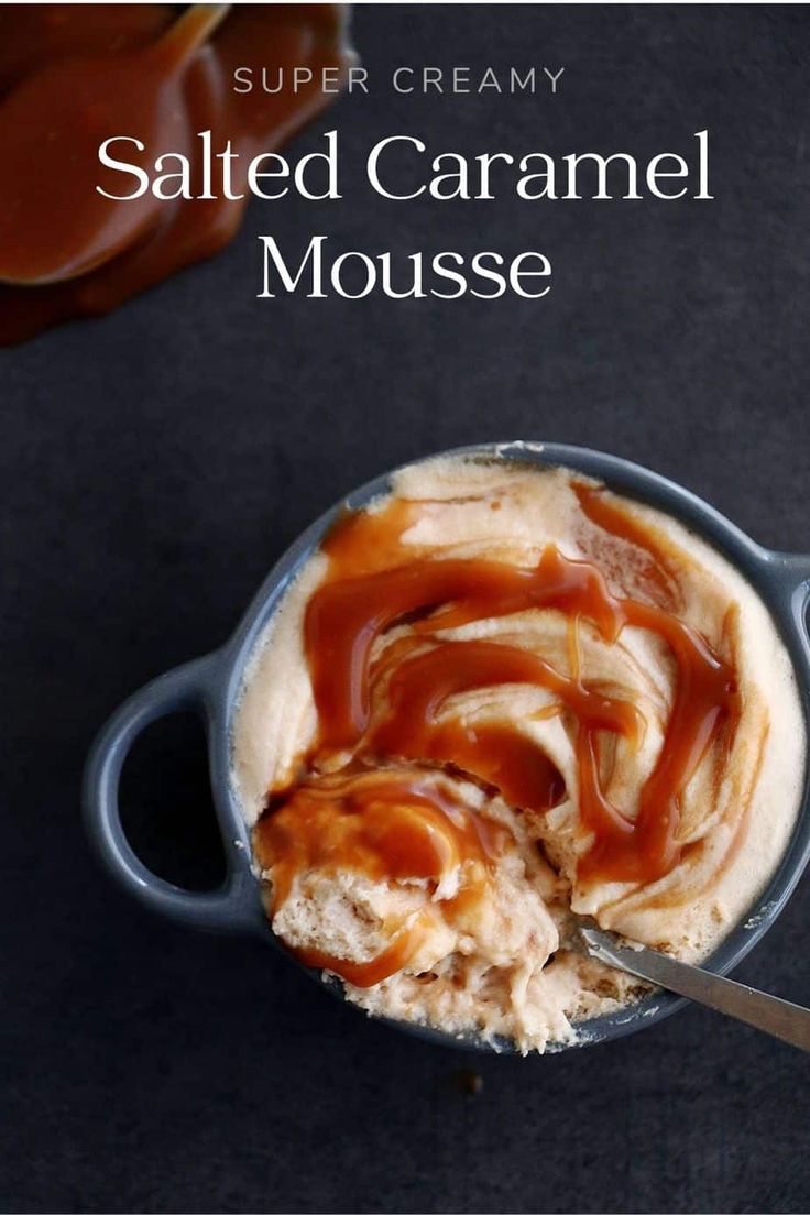 salted caramel mousse in a blue bowl with spoon on the side