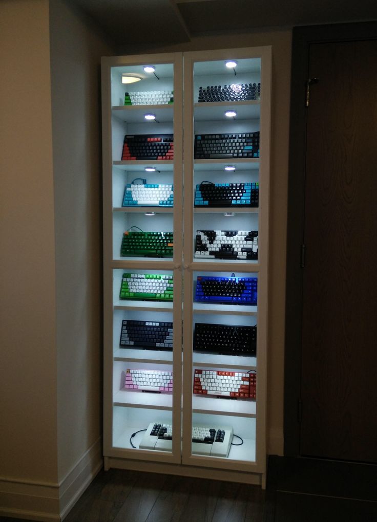 a large display case filled with lots of different colored items in it's glass doors