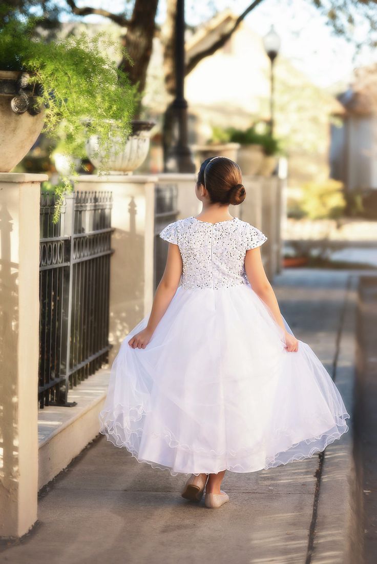 A little sparkle and a little glam, this white sparkly frock will have all eyes on her! A stretch sequin bodice, fully lined with soft cotton, sits above a bountiful tulled skirt, perfect for the girl and her twirl.  Fully lined with soft cotton and back zips.  Machine wash, hang dry. Dog Size Chart, Sequin Flower, All Eyes, All About Eyes, Dress White, Happily Ever After, Ever After, Tulle Skirt, Bodice