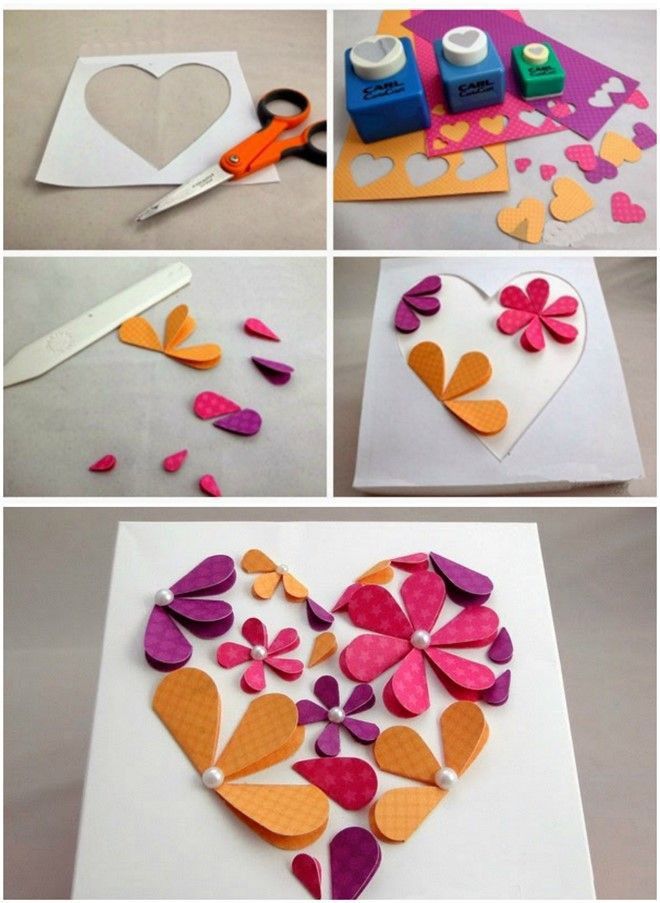 paper hearts are cut out with scissors and glue