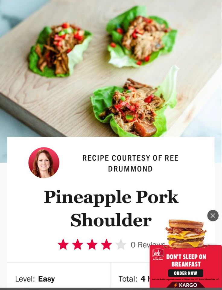 the recipe for pineapple pork shoulder is displayed on a wooden cutting board with three small lettuce leaves