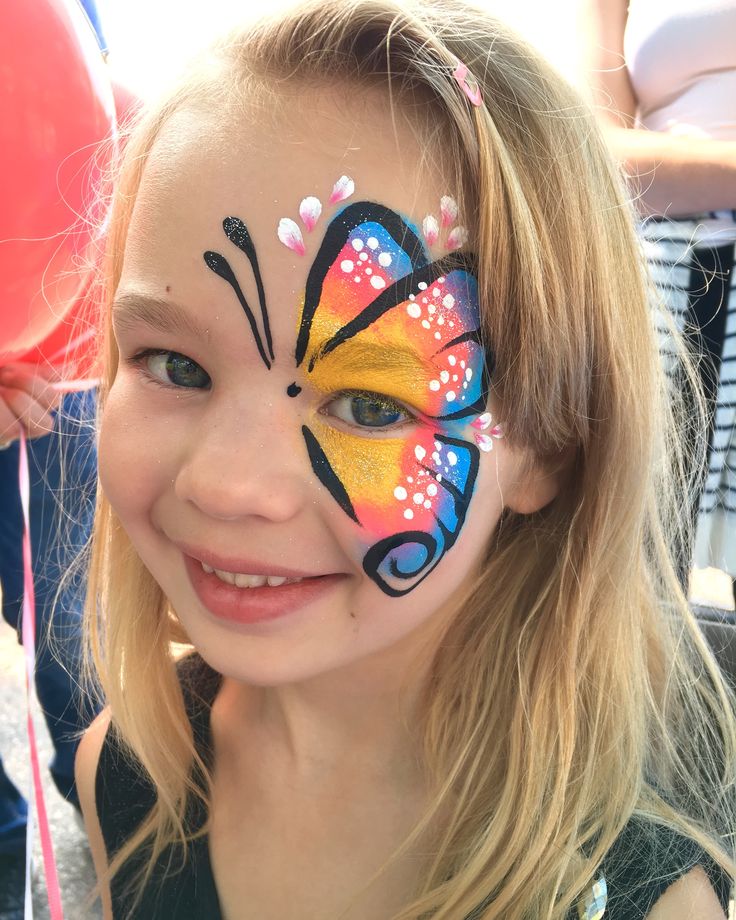 A half face butterfly design face painted from our face painter Niloo. Kid Makeup, Easter Face Paint, Face Butterfly, Easy Face Painting Designs, Bodysuit Tattoos, Clown Stuff, Festival Face Paint, Butterfly Face Paint, Professional Face Paint